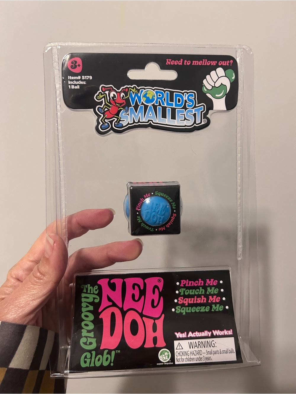 World's Smallest Groovy NeeDoh Glob! Black Toy with Blue Center